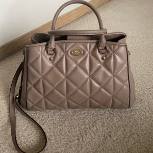 Lovely tan medium sized Coach satchel!  Treated with a lot of love and care!